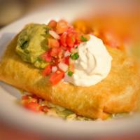 Chimichanga · Deep fry burrito with your choice of meat with rice, beans and cheese inside and topped with...