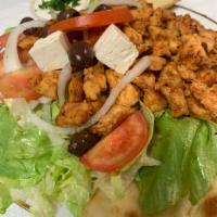 Greek Chicken Salad · Our Greek salad comes with lettuce, tomatoes, onions, Greek olives, feta cheese and our hous...