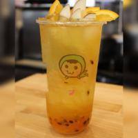Tropical Fresh Fruit Tea · Fresh Passion fruit, pineapple, apple, orange, lime juice with Green Tea (topping not includ...