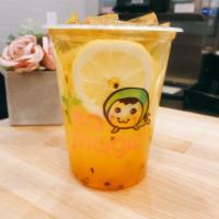 Passion Lemon Green Tea · Fresh Passion Fruit and lemon with green tea, Toppings are not included.