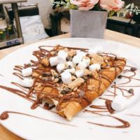 S'mores Crepe · Marshmallow, chocolate chip, grahams cracker with Nutella