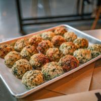 Family/Party - Organic Turkey Meatballs (20 pieces)  · Fully Baked Organic Turkey, Spinach and Quinoa Meatballs. 
Served with House-made Tomato sau...