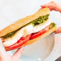  Fresh Mozzarella, Tomatoes &  Signature Pesto Sandwich (Vegetarian) ·  On a Pain D'Avignon Toasted Baguette