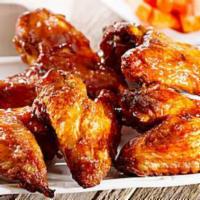 Spices Chicken Wings · Tandoori posted chicken wings served with lemon and mint sauce. Spicy.