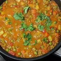 Mixed Veg Curry · Mixed vegetable seasoned in a medium thin curry. Spicy. Vegetarian.