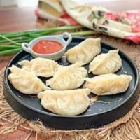 10 Piece Veg Momo · Dumplings. Chopped cabbage, onion coriander ginger wrapped with pastry gow (dumplings wrappe...