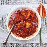 Chicken Vindaloo · Boneless chicken cooked with fresh vindaloo paste and spice. Spicy.