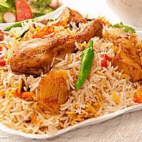 Chicken Biryani · Dish made form mixture of spices basmati rice and chicken.