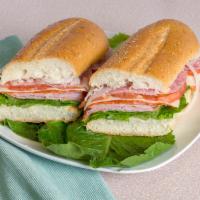 9. Godfather Sandwich · Cappy ham, salami, pepperoni, provolone, lettuce, tomato, onions, oil, and vinegar.