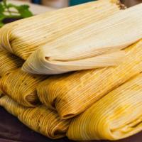 TAMALES · Traditional tamal, made of masa or dough all natural corn based, steamed in a corn husk 