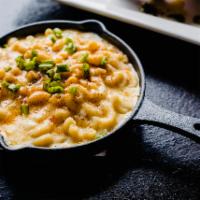  MACARONI AND CHEESE · Elbows in white cheddar cream,  bread crumbs