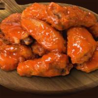 Buff Wings · Cooked wing of a chicken coated in sauce or seasoning.