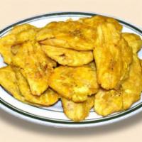 Tostones ·  Fried Green plantains.