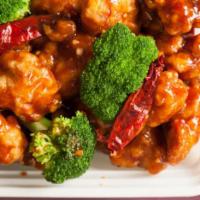 H2. General Tso's Chicken · Chunk chicken fried in a spicy sauce and sauteed with broccoli. Hot and spicy.