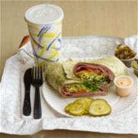 The Cuban Wraps · Choice of wrap with slow cooked Carnita, thin sliced cured Ham,  cheese with sliced pickle, ...