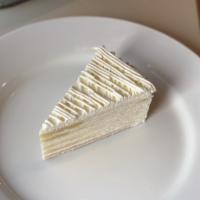 1 Piece Durian Mille Crepe Cake · Durian, Unsalted Butter, Flour, Cream, Eggs, Vanilla Beans,Milk, Sugar