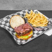 Pastrami Burger · Prime beef burger grilled to perfection with two slices of grilled pastrami.