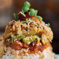 Sushi Tower · Delicate pieces of salmon, white tuna and maguro are layered with crab salad, avocado and ri...