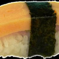 Tamago Nigiri · Egg. Sushi laid top of rice.