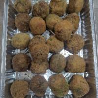 Boudin Balls · 3 pieces. Fried sausage that has been rolled into a ball. 