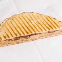 Ranchero Panini · Chipotle Chicken, Beef bacon, Yellow American, Ranch dressing.Served on pressed European fla...