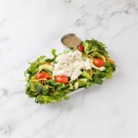 Chunky Chicken Salad Platter · Chicken salad on top of a tossed salad