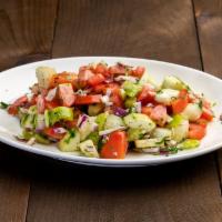 Shepherd Salad · Fine chopped tomatoes, green peppers, cucumbers, onions, dill, parsley tossed with olive oil...