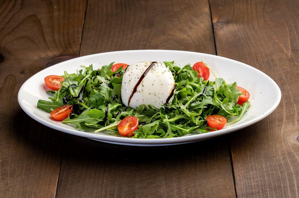 Burrata Cheese Salad · Served with baby arugula, cherry tomatoes. Olive oil and balsamic glaze dressing.