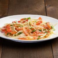 Achichuk Salad  · Tomato, onion, chopped cilantro, olive oi and white vinegar.