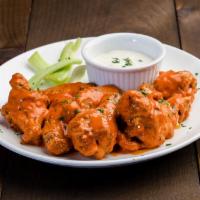 Chicken Wings · Spicy Buffalo, BBQ, garlic Parmesan sauce or chili lime sauce. Served with blue cheese dress...