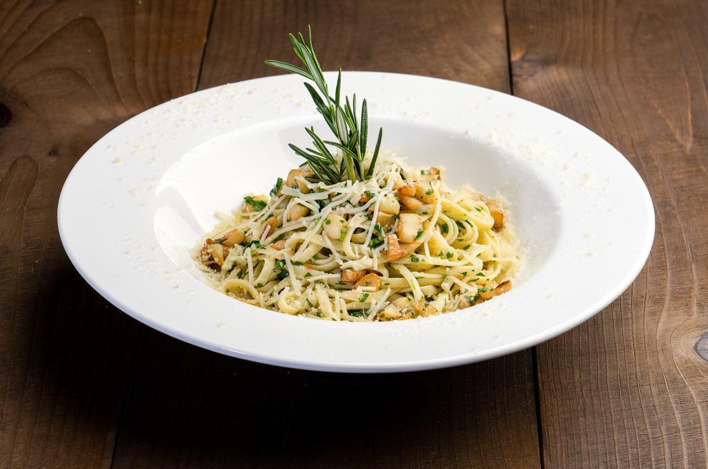 Garlic and  Olive Oil · Aglio e Olio. Pasta with extra virgin olive oil and garlic topped with parmigiano cheese, parsley and basil.