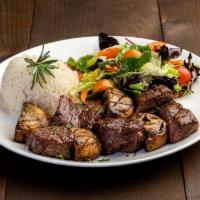 Beef Shish · Grilled marinated beef served with house salad and rice.