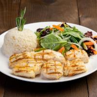 Chicken Shish · Marinated cubes of chicken grilled on skewer served with house salad rice.
