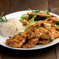 Chicken Chops · Marinated chicken chops served with house salad and rice.