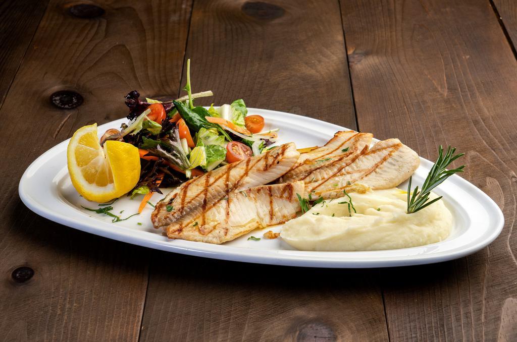 St. Peter Fishers · Fillet flaky white meat with mushroom, garlic lemon butter sauce or char-grilled. Served with rice.