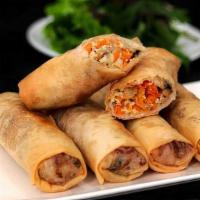 A4. Cha Gio/Egg Rolls · 4 rolls. Crispy rolls with homemade fried pork, shrimp, taro and carrot served with sweet ch...