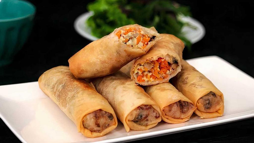 A4. Cha Gio/Egg Rolls · 4 rolls. Crispy rolls with homemade fried pork, shrimp, taro and carrot served with sweet chili sauce.