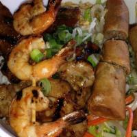 V1. Bun Tom Thit Nuong Cha Gio/Brothers Special · Grilled shrimp, charbroiled pork and spring rolls served with vegetables, vermicelli noodle ...