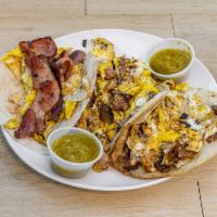 Taco Trio Breakfast · Includes 1 each brisket and egg, bacon and egg and potato and egg tacos with side of salsa.