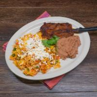 Carne Asada · Served with grilled onion, pico de gallo, guacamole, sour cream, rice and charro beans. 3 to...