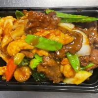 SP5. Mandarin Delight · Shrimp, beef, chicken sauteed with mixed vegetables in garlic sauce. Hot and spicy.