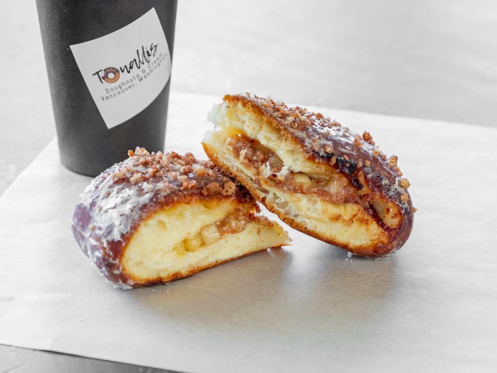 Signature Donut: Tonallis Supreme Bar · 1 Piece: Your choice of Apple Crumb or Blueberry Cream Cheese. FRIDAY AND SATURDAY ONLY!