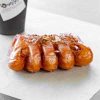Bear Claw · 1 Piece: Apple filled with the Choice of Glazed or Cinnamon Crumb-Cake Topping. 