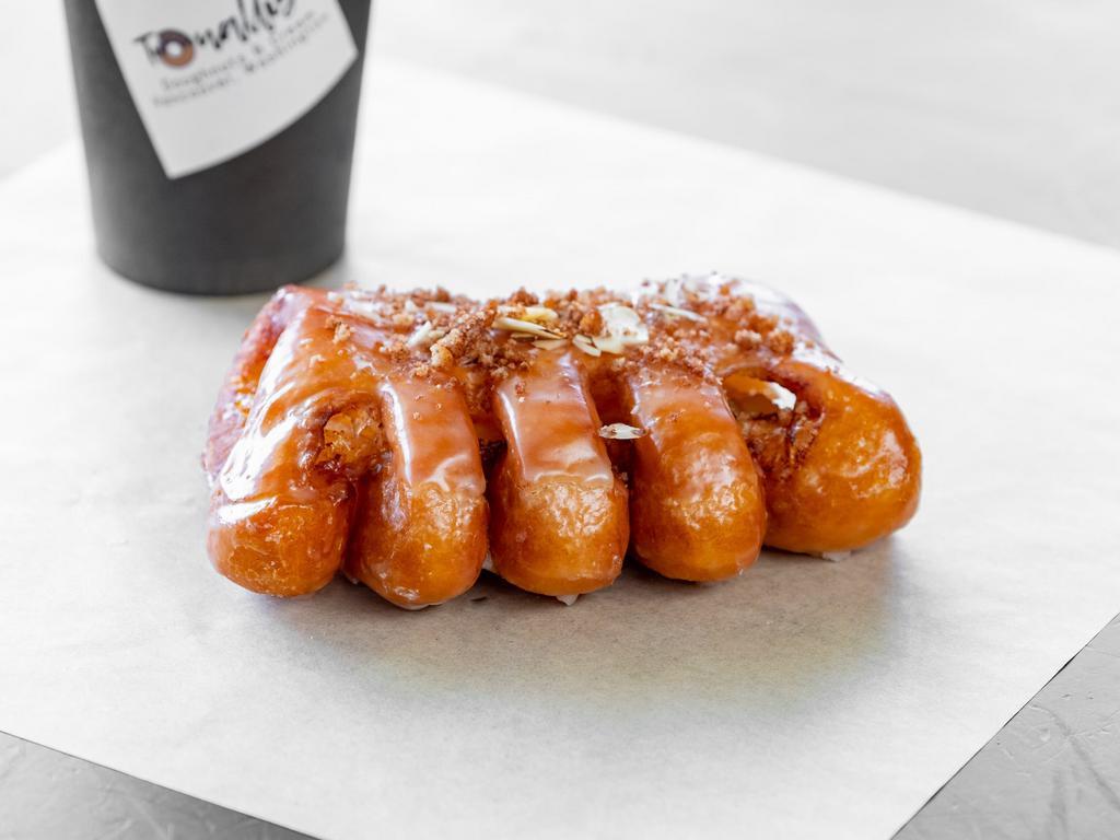 Bear Claw · 1 Piece: Apple filled with the Choice of Glazed or Cinnamon Crumb-Cake Topping. 
