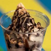 Brownie Sundae · We start with brownie bites on the bottom and top it with delicious country vanilla frozen y...