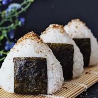 Eel Onigeri  · 2 Pc Onigeri.Eel and oshinko inside (Japanese yellow raddish) wrapped with sushi rice and se...