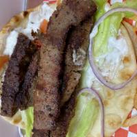 Gyro Sandwich (w/Fries) · gyro (lamb & beef) with lettuce tomatoes red onions & tzatziki sauce wrapped in pita bread &...