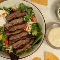 Fajita Salad · Mixed greens, tomato, mixed cheese, sour cream, and fresh guacamole with your choice of stea...