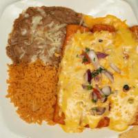 Enchiladas de Queso · 2 Cheese enchiladas topped with our fresh Chile con queso and garnished with our fresh Pico ...