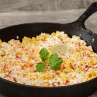 Elote · Traditional street corn with mayo, pepper, and queso fresco.